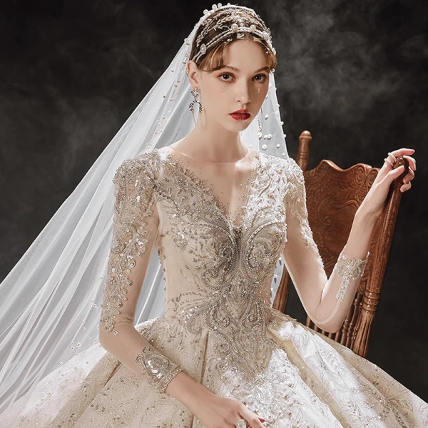 Luxury / Gorgeous Champagne Bridal Wedding Dresses 2020 Ball Gown See-through Scoop Neck Long Sleeve Backless Beading Sequins Glitter Tulle Cathedral Train Ruffle