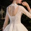 Illusion Champagne Bridal Wedding Dresses 2020 Ball Gown High Neck 3/4 Sleeve Backless Beading Glitter Tulle Royal Train Ruffle