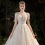 Luxury / Gorgeous Champagne Bridal Wedding Dresses 2020 Ball Gown See-through Scoop Neck Short Sleeve Backless Appliques Flower Beading Rhinestone Glitter Tulle Cathedral Train Ruffle