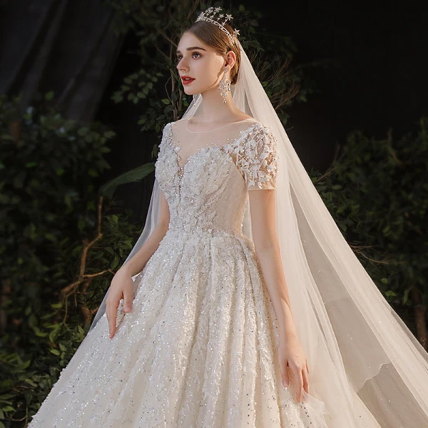 Luxury / Gorgeous Champagne Bridal Wedding Dresses 2020 Ball Gown See-through Scoop Neck Short Sleeve Backless Appliques Flower Beading Rhinestone Glitter Tulle Cathedral Train Ruffle