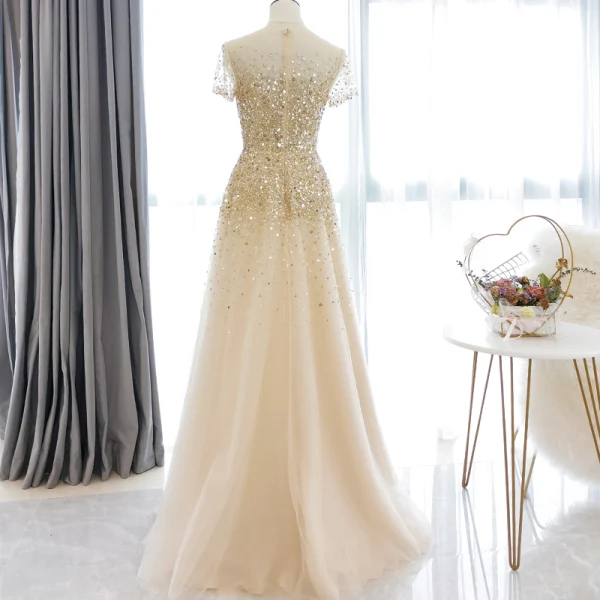 Haut de Gamme Champagne Transparentes Robe De Bal 2020 Princesse Encolure Dégagée Manches Courtes Perlage Paillettes Longue Volants Robe De Ceremonie