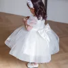 Elegante Weiß Durchsichtige Hochzeit Blumenmädchenkleider 2020 Prinzessin Rundhalsausschnitt Geschwollenes Kurze Ärmel Perlenstickerei Schleife Kurze Kleider Für Hochzeit