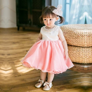Charmant Perle Rose Organza Anniversaire Robe Ceremonie Fille 2020 Robe Boule Encolure Dégagée Sans Manches Perle Courte Volants Robe Pour Mariage