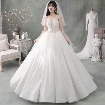 Meilleur Ivoire Jardin Extérieur Robe De Mariée 2020 Robe Boule Bretelles Spaghetti Sans Manches Dos Nu Appliques Fleur Perlage Glitter Tulle Longue Volants
