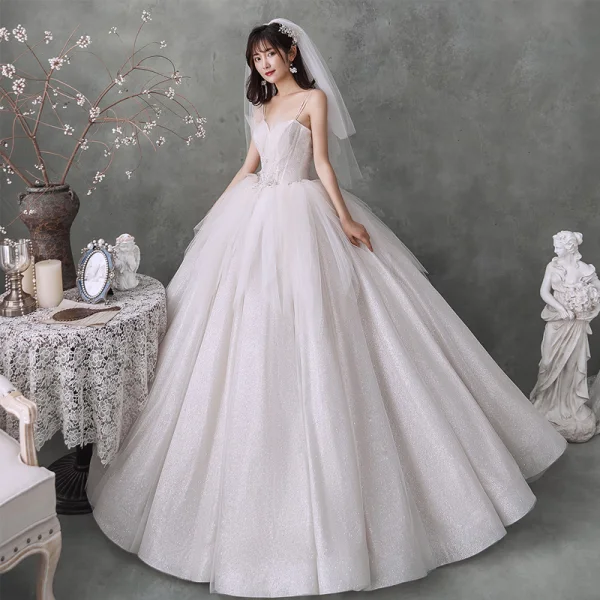 Best Ivory Outdoor / Garden Wedding Dresses 2020 Ball Gown Spaghetti Straps Sleeveless Backless Appliques Flower Beading Glitter Tulle Floor-Length / Long Ruffle