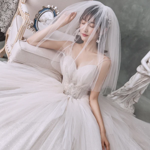 Best Ivory Outdoor / Garden Wedding Dresses 2020 Ball Gown Spaghetti Straps Sleeveless Backless Appliques Flower Beading Glitter Tulle Floor-Length / Long Ruffle