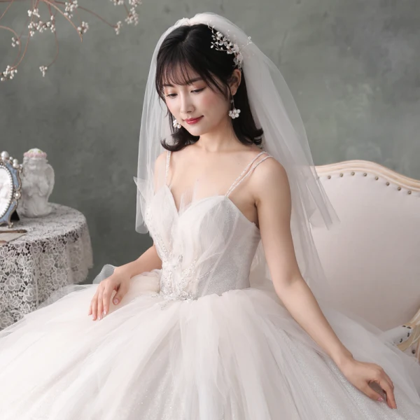 Best Ivory Outdoor / Garden Wedding Dresses 2020 Ball Gown Spaghetti Straps Sleeveless Backless Appliques Flower Beading Glitter Tulle Floor-Length / Long Ruffle