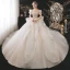 Luxe Champagne La Mariée Robe De Mariée 2020 Robe Boule Transparentes Encolure Dégagée Gonflée Manches Courtes Dos Nu Perlage Paillettes Glitter Tulle Royal Train Volants