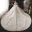 Luxe Champagne La Mariée Robe De Mariée 2020 Robe Boule Transparentes Encolure Dégagée Gonflée Manches Courtes Dos Nu Perlage Paillettes Glitter Tulle Royal Train Volants