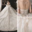 Luxe Champagne La Mariée Robe De Mariée 2020 Robe Boule Transparentes Encolure Dégagée Gonflée Manches Courtes Dos Nu Perlage Paillettes Glitter Tulle Royal Train Volants