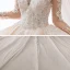 Luxe Champagne La Mariée Robe De Mariée 2020 Robe Boule Transparentes Encolure Dégagée 3/4 Manches Dos Nu Glitter Tulle Appliques En Dentelle Paillettes Perlage Cathedral Train Volants