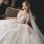 Luxury / Gorgeous Bridal Champagne Wedding Dresses 2020 Ball Gown See-through Scoop Neck Long Sleeve Backless Appliques Lace Beading Sequins Cathedral Train Ruffle