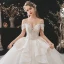 Luxury / Gorgeous Bridal Champagne Wedding Dresses 2020 Ball Gown See-through Scoop Neck Long Sleeve Backless Appliques Lace Beading Sequins Cathedral Train Ruffle