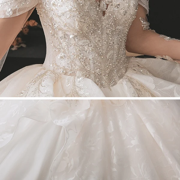 Luxury / Gorgeous Bridal Champagne Wedding Dresses 2020 Ball Gown See-through Scoop Neck Long Sleeve Backless Appliques Lace Beading Sequins Cathedral Train Ruffle