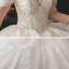 Luxury / Gorgeous Bridal Champagne Wedding Dresses 2020 Ball Gown See-through Scoop Neck Long Sleeve Backless Appliques Lace Beading Sequins Cathedral Train Ruffle