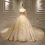 Stunning Gold Bridal Wedding Dresses 2020 Ball Gown See-through Scoop Neck Long Sleeve Backless Appliques Lace Handmade  Beading Glitter Tulle Royal Train Ruffle