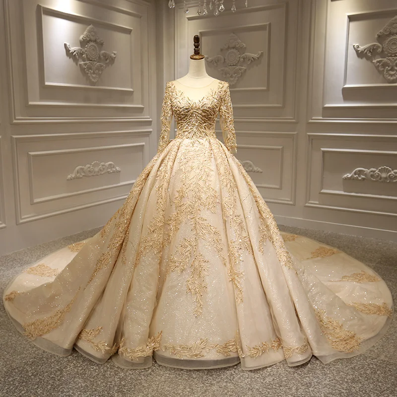 Stunning Gold Bridal Wedding Dresses 2020 Ball Gown See-through Scoop Neck Long Sleeve Backless Appliques Lace Handmade Beading Glitter Tulle Royal Train Ruffle Stunning Gold Bridal Wedding Dresses 2020 Ball Gown See-through Scoop Neck Long Sleeve Backless Appliques Lace Handmade Beading Glitter Tulle Royal Train Ruffle