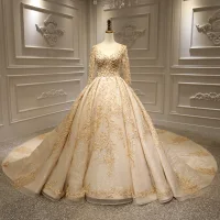 Maravilloso Oro Boda Vestidos De Novia 2020 Ball Gown Transparentes Scoop Escote Manga Larga Sin Espalda Apliques Con Encaje Hecho a mano Rebordear Glitter Tul Royal Train Ruffle