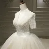 Stunning Champagne Bridal Wedding Dresses 2020 Ball Gown Deep V-Neck Short Sleeve Handmade  Beading Pearl Glitter Tulle Cathedral Train
