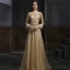 Meilleur Champagne Doré Dansant Robe De Bal 2020 Princesse Transparentes Encolure Dégagée Manches Longues Ceinture Perlage Paillettes Plumes Longue Volants Robe De Ceremonie