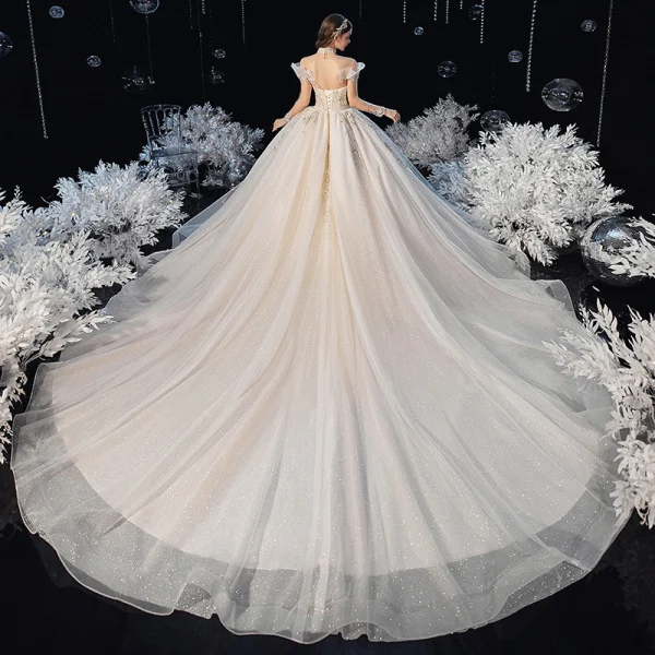 Schöne Champagner Durchsichtige Hochzeits Brautkleider / Hochzeitskleider 2020 Ballkleid Stehkragen Lange Ärmel Rückenfreies Perlenstickerei Pailletten Glanz Tülle Kathedrale Schleppe Rüschen