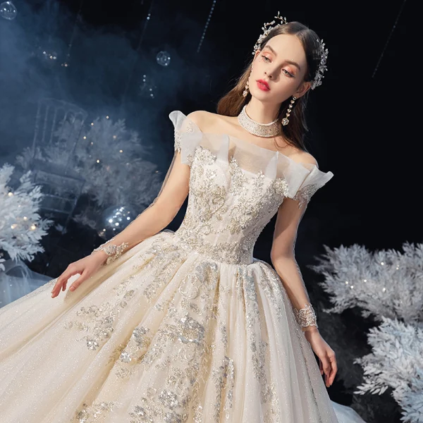 Schöne Champagner Durchsichtige Hochzeits Brautkleider / Hochzeitskleider 2020 Ballkleid Stehkragen Lange Ärmel Rückenfreies Perlenstickerei Pailletten Glanz Tülle Kathedrale Schleppe Rüschen