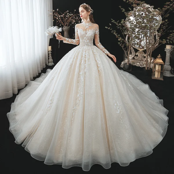 Romantique Champagne La Mariée Robe De Mariée 2020 Robe Boule Transparentes Col Haut Manches Longues Dos Nu Perlage Paillettes Fleur Glitter Tulle Cathedral Train Volants