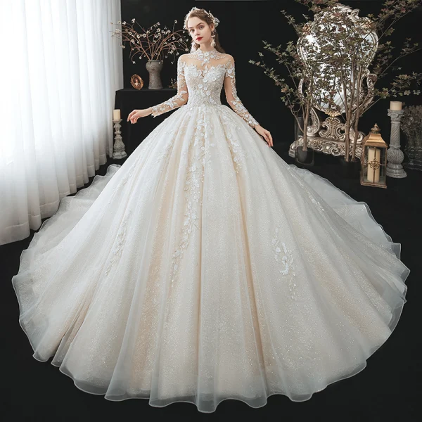 Romantique Champagne La Mariée Robe De Mariée 2020 Robe Boule Transparentes Col Haut Manches Longues Dos Nu Perlage Paillettes Fleur Glitter Tulle Cathedral Train Volants
