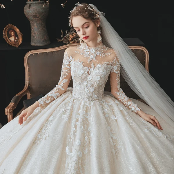 Romantique Champagne La Mariée Robe De Mariée 2020 Robe Boule Transparentes Col Haut Manches Longues Dos Nu Perlage Paillettes Fleur Glitter Tulle Cathedral Train Volants