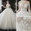 Romantique Champagne La Mariée Robe De Mariée 2020 Robe Boule Transparentes Col Haut Manches Longues Dos Nu Perlage Paillettes Fleur Glitter Tulle Cathedral Train Volants