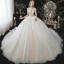 Charmant Champagne La Mariée Robe De Mariée 2020 Robe Boule Transparentes Encolure Dégagée 3/4 Manches Dos Nu Appliques En Dentelle Perlage Glitter Tulle Cathedral Train Volants