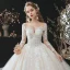 Charmant Champagne La Mariée Robe De Mariée 2020 Robe Boule Transparentes Encolure Dégagée 3/4 Manches Dos Nu Appliques En Dentelle Perlage Glitter Tulle Cathedral Train Volants