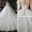 Charmant Champagne La Mariée Robe De Mariée 2020 Robe Boule Transparentes Encolure Dégagée 3/4 Manches Dos Nu Appliques En Dentelle Perlage Glitter Tulle Cathedral Train Volants
