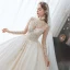 Romantique Champagne La Mariée Robe De Mariée 2020 Robe Boule Transparentes Col Haut Manches Longues Dos Nu Perlage Glitter Tulle Cathedral Train Volants