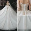 Romantique Champagne La Mariée Robe De Mariée 2020 Robe Boule Transparentes Col Haut Manches Longues Dos Nu Perlage Glitter Tulle Cathedral Train Volants