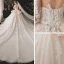 Charming Champagne Bridal Wedding Dresses 2020 Ball Gown See-through Scoop Neck Long Sleeve Backless Appliques Lace Beading Glitter Tulle Cathedral Train Ruffle