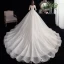 Abordable Ivoire La Mariée Robe De Mariée 2020 Robe Boule Encolure Dégagée Sans Manches Dos Nu Perlage Paillettes Cathedral Train Volants