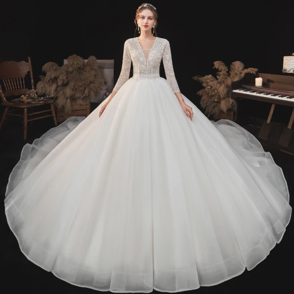 Romantique Ivoire La Mariée Robe De Mariée 2020 Robe Boule Transparentes Col v profond 3/4 Manches Dos Nu Perlage Glitter Tulle Cathedral Train Volants