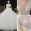 Romantique Ivoire La Mariée Robe De Mariée 2020 Robe Boule Transparentes Col v profond 3/4 Manches Dos Nu Perlage Glitter Tulle Cathedral Train Volants