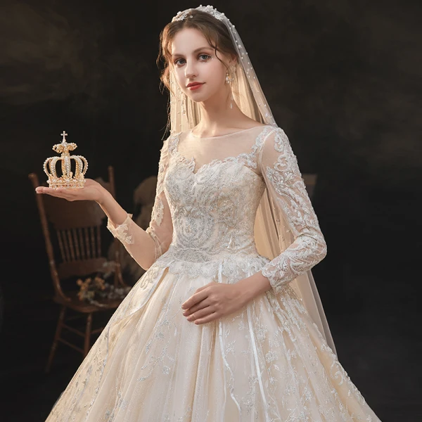 High-end Champagne Bridal Wedding Dresses 2020 Ball Gown See-through Scoop Neck Long Sleeve Backless Appliques Lace Beading Glitter Tulle Cathedral Train Ruffle