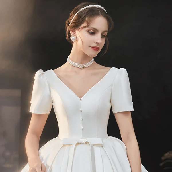 Vintage / Retro Ivory Satin Bridal Wedding Dresses 2020 Ball Gown V-Neck Puffy Short Sleeve Backless Beading Pearl Bow Cathedral Train Ruffle