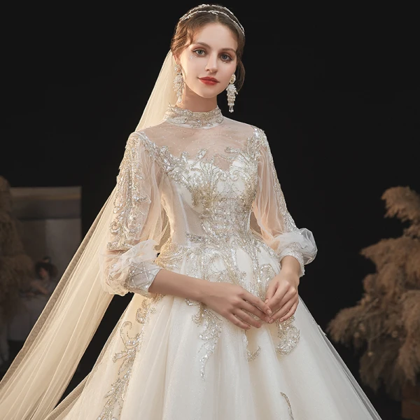 Viktorianischer Stil Champagner Durchsichtige Hochzeits Brautkleider / Hochzeitskleider 2020 Ballkleid Stehkragen Geschwollenes 3/4 Ärmel Rückenfreies Applikationen Spitze Perlenstickerei Pailletten Glanz Tülle Kathedrale Schleppe Rüschen