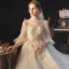 Viktorianischer Stil Champagner Durchsichtige Hochzeits Brautkleider / Hochzeitskleider 2020 Ballkleid Stehkragen Geschwollenes 3/4 Ärmel Rückenfreies Applikationen Spitze Perlenstickerei Pailletten Glanz Tülle Kathedrale Schleppe Rüschen