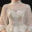 Viktorianischer Stil Champagner Durchsichtige Hochzeits Brautkleider / Hochzeitskleider 2020 Ballkleid Stehkragen Geschwollenes 3/4 Ärmel Rückenfreies Applikationen Spitze Perlenstickerei Pailletten Glanz Tülle Kathedrale Schleppe Rüschen
