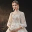 Viktorianischer Stil Champagner Durchsichtige Hochzeits Brautkleider / Hochzeitskleider 2020 Ballkleid Stehkragen Geschwollenes 3/4 Ärmel Rückenfreies Applikationen Spitze Perlenstickerei Pailletten Glanz Tülle Kathedrale Schleppe Rüschen