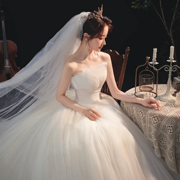Modest / Simple Ivory Bridal Wedding Dresses 2020 A-Line / Princess Strapless Sleeveless Backless Cathedral Train Ruffle