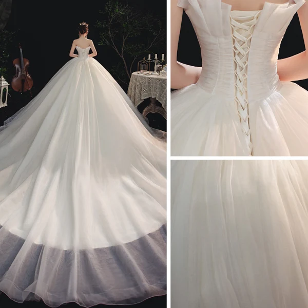 Modest / Simple Ivory Bridal Wedding Dresses 2020 A-Line / Princess Strapless Sleeveless Backless Cathedral Train Ruffle