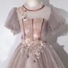 Vintage Szampan Przezroczyste Taniec Sukienki Na Bal 2020 Suknia Balowa Wysokiej Szyi Bufiasta Kótkie Rękawy Aplikacje Z Koronki Frezowanie Długie Wzburzyć Bez Pleców Sukienki Wizytowe
