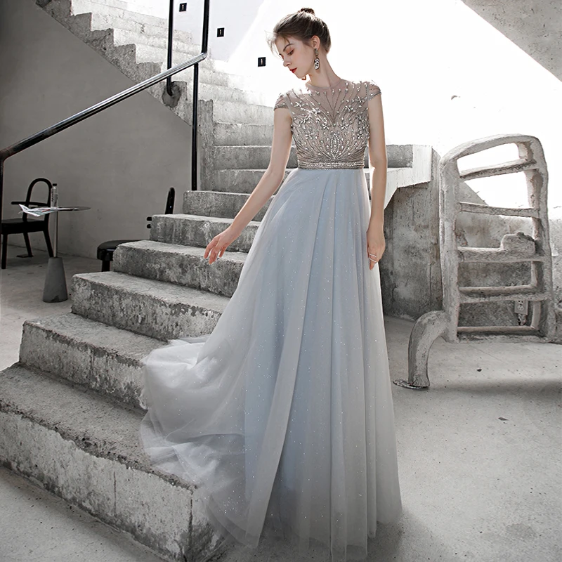 High End Sky Blue Prom Dresses 2020 A Line Princess See Through Scoop Neck  Sleeveless Beading Rhinestone Glitter Tulle Sweep Train Ruffle Backless