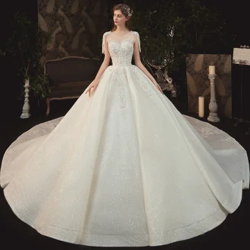 Elegant Champagne Bridal Wedding Dresses 2020 Ball Gown See Through Scoop Neck Short Sleeve Backless Glitter Tulle Beading Tassel Appliques Lace Cathedral Train Ruffle